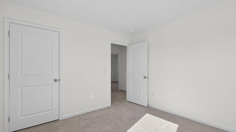 Bedroom with carpet floor and closet