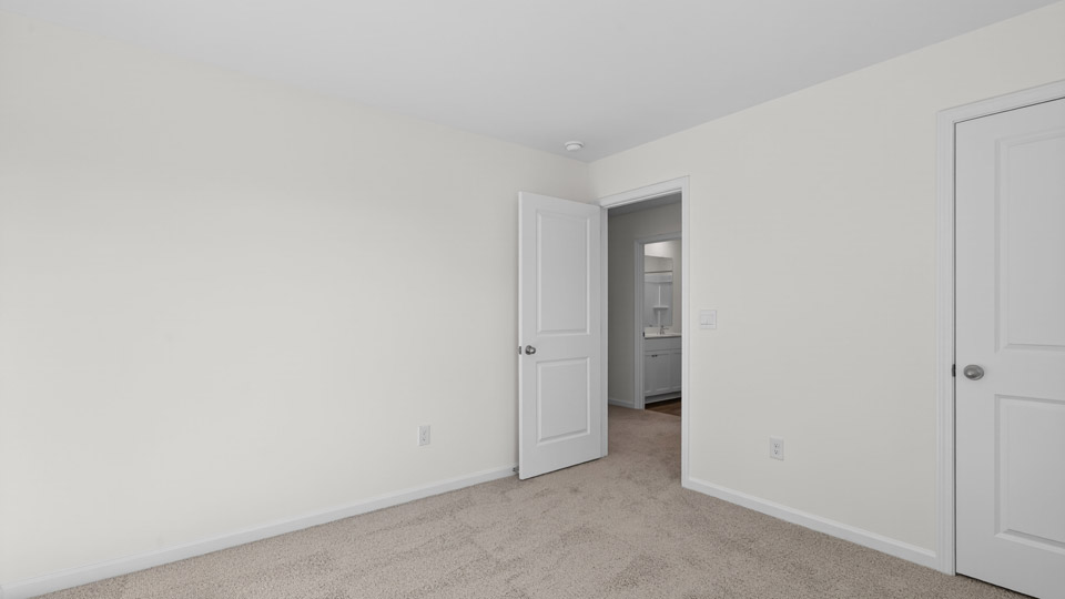 Bedroom with carpet floor and closet