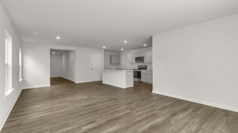 open concept living space with large windows