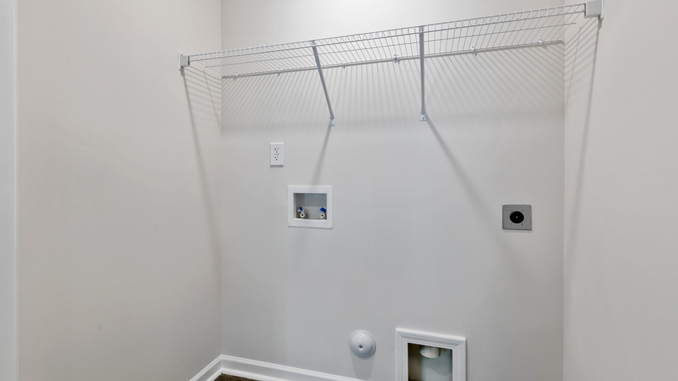 laundry room with vinyl flooring