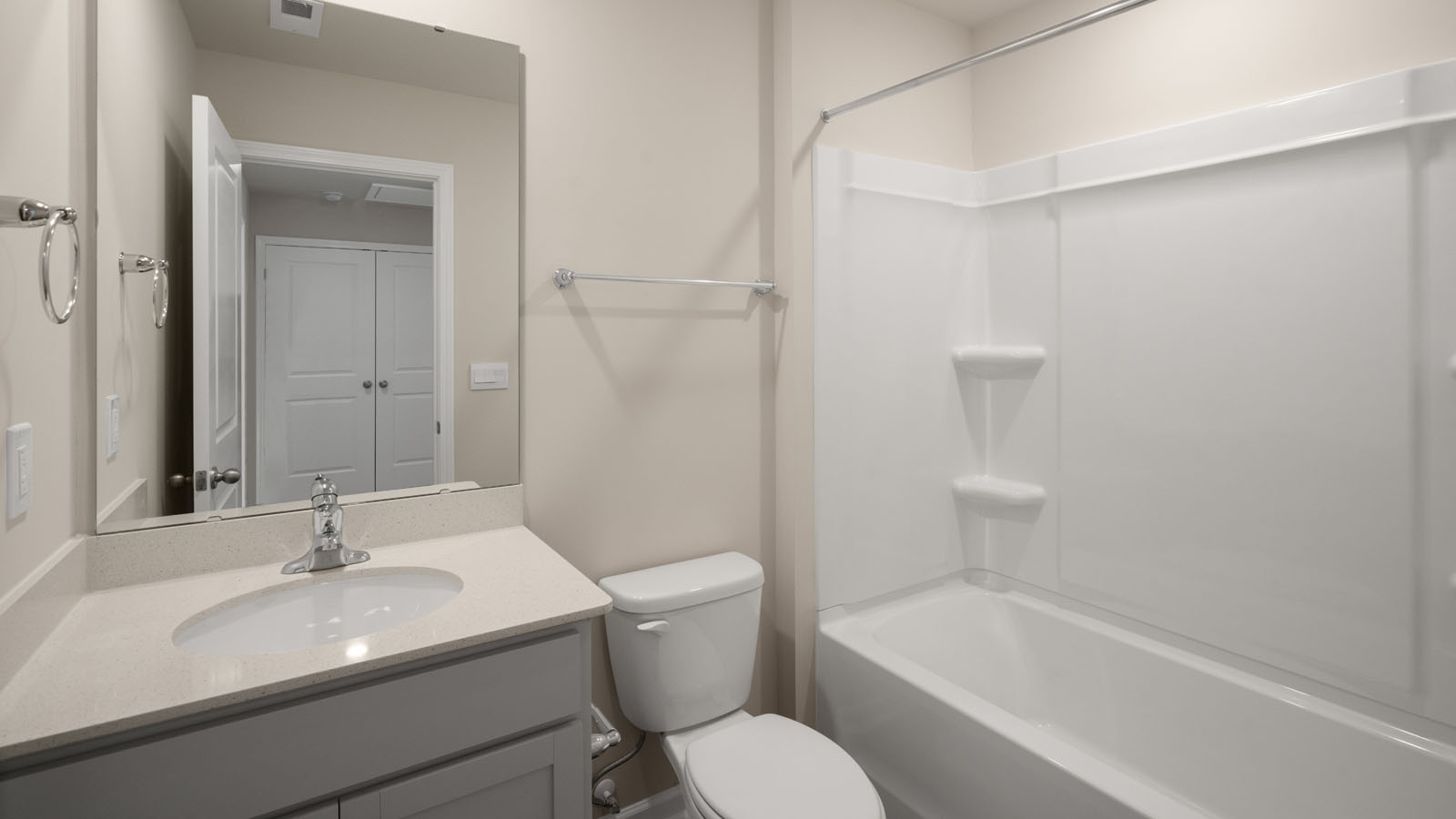 bathroom with quartz countertops