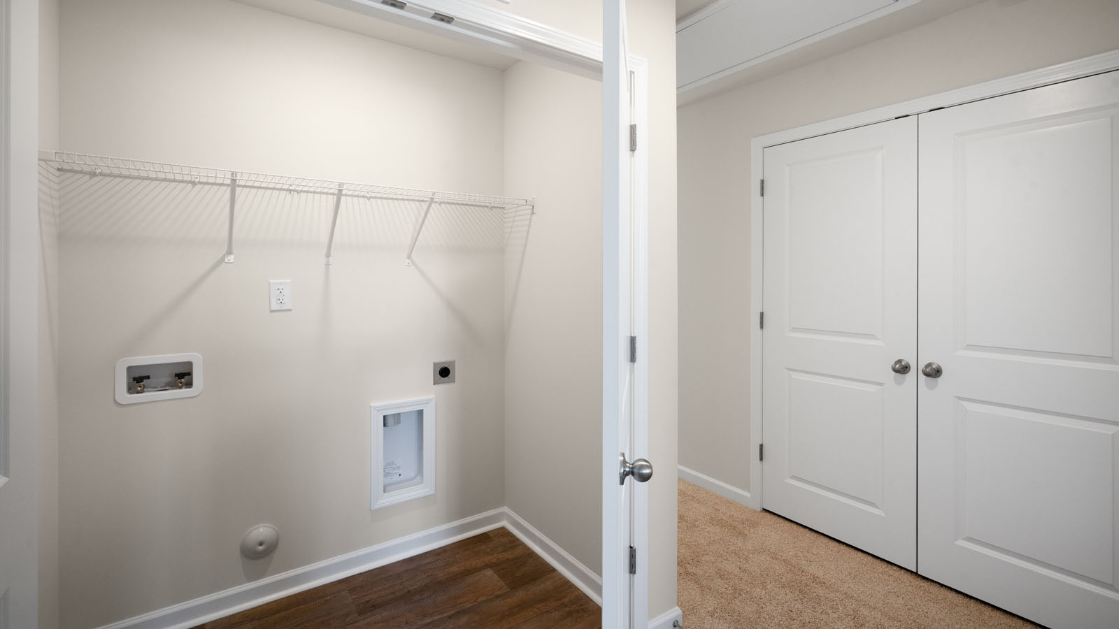 laundry room with vinyl flooring