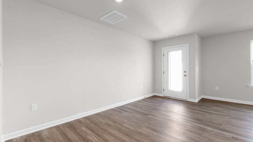 open concept living space with large windows