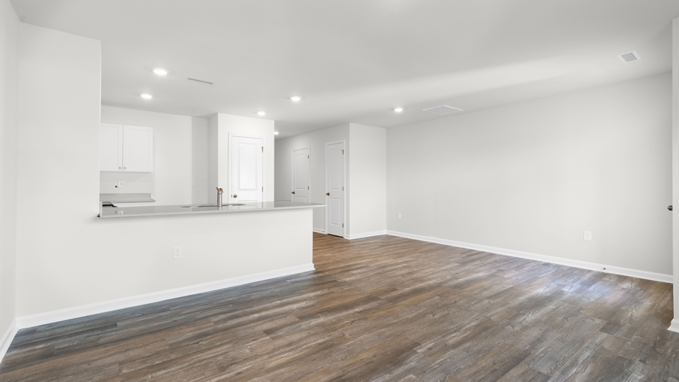 open concept living space with large windows