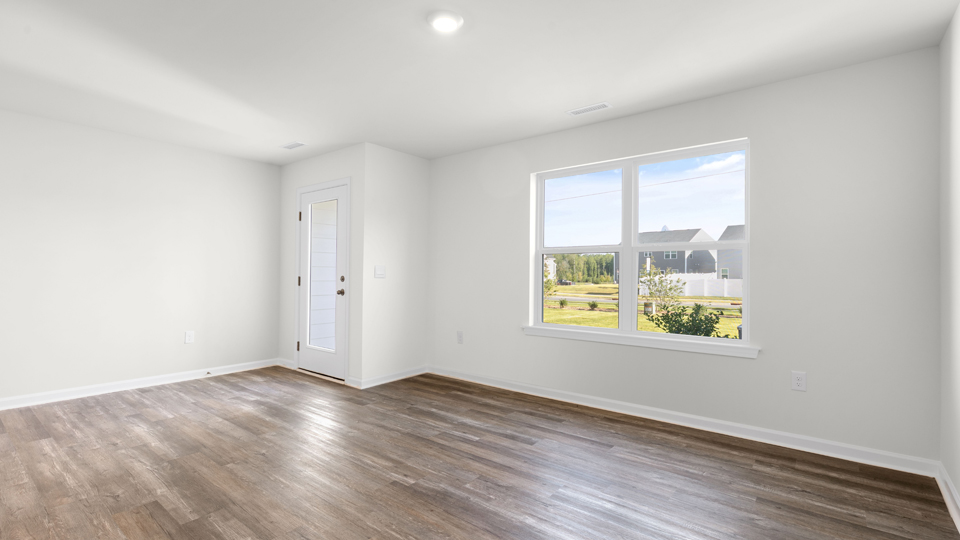 open concept living space with large windows