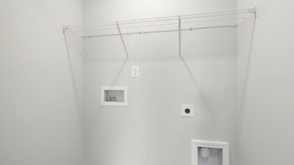 laundry room with wire shelving