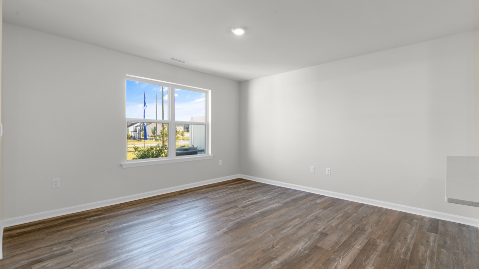 open concept living space with large windows