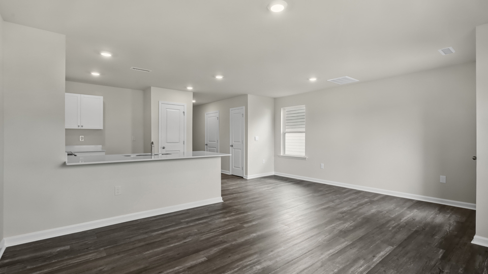 open concept living space with large windows