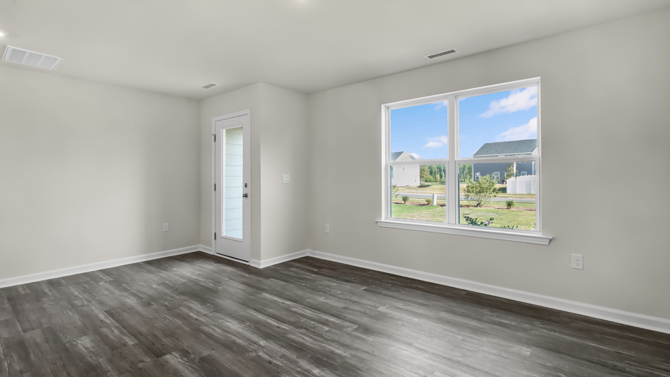 open concept living space with large windows
