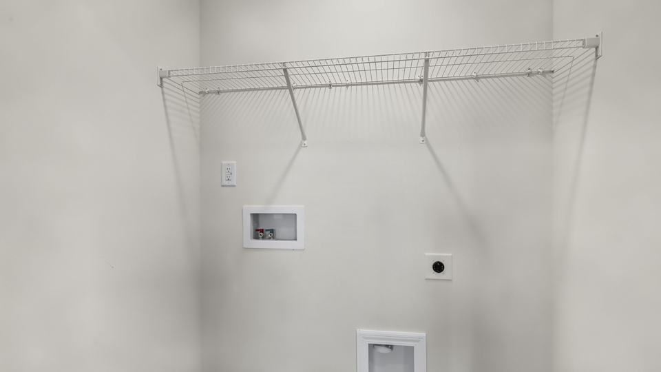 laundry room with wire shelving