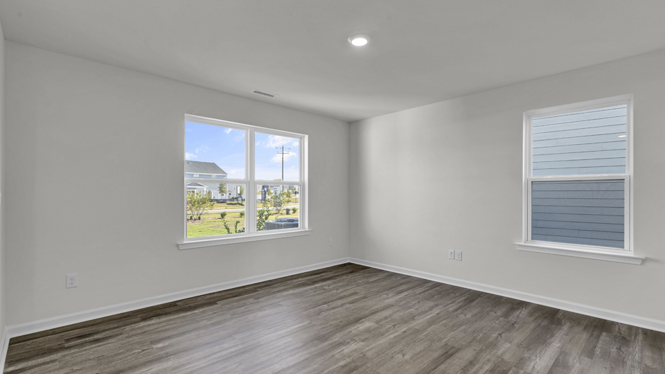 open concept living space with large windows