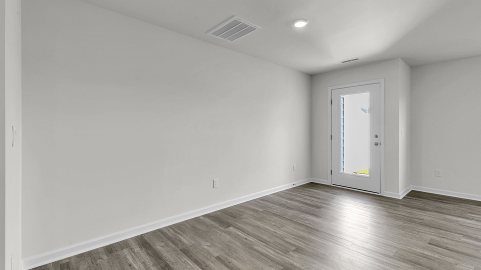 open concept living space with large windows