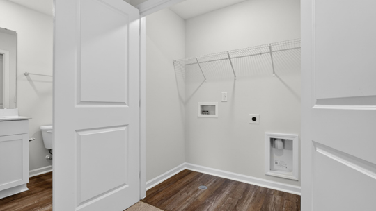 laundry room with wire shelving
