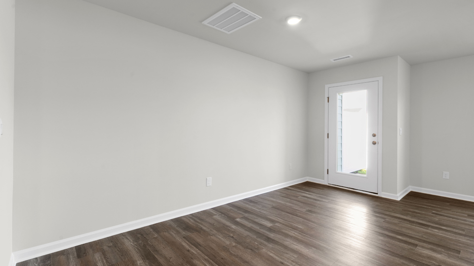 open concept living space with large windows