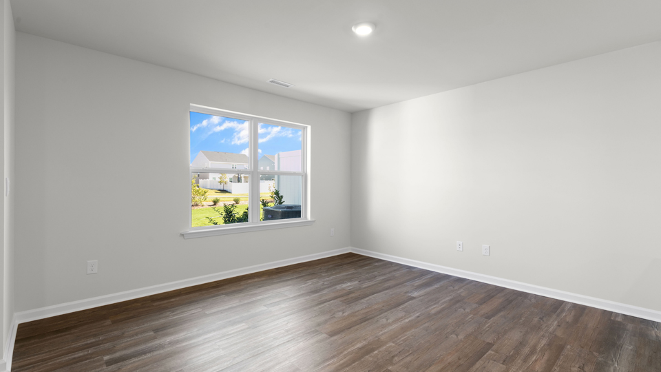 open concept living space with large windows