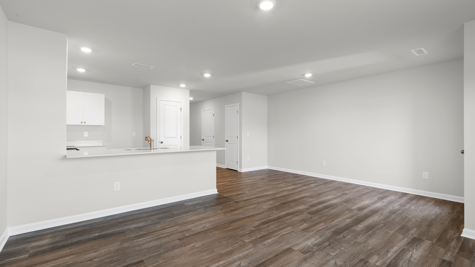 open concept living space with large windows