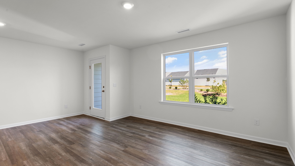 open concept living space with large windows
