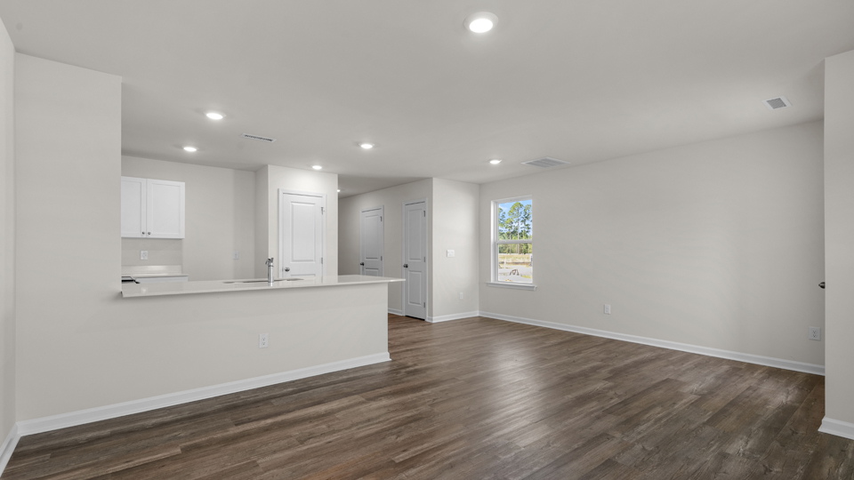 open concept living space with large windows