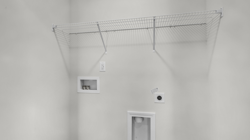 laundry room with wire shelving