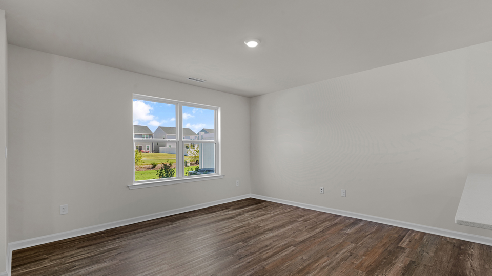 open concept living space with large windows
