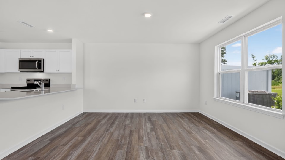 open concept living space with large windows