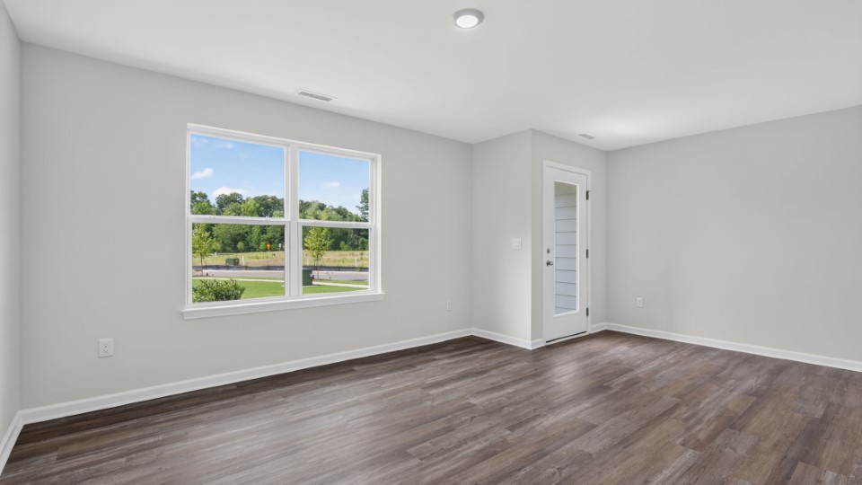 open concept living space with large windows