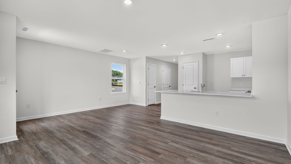 open concept living space with large windows