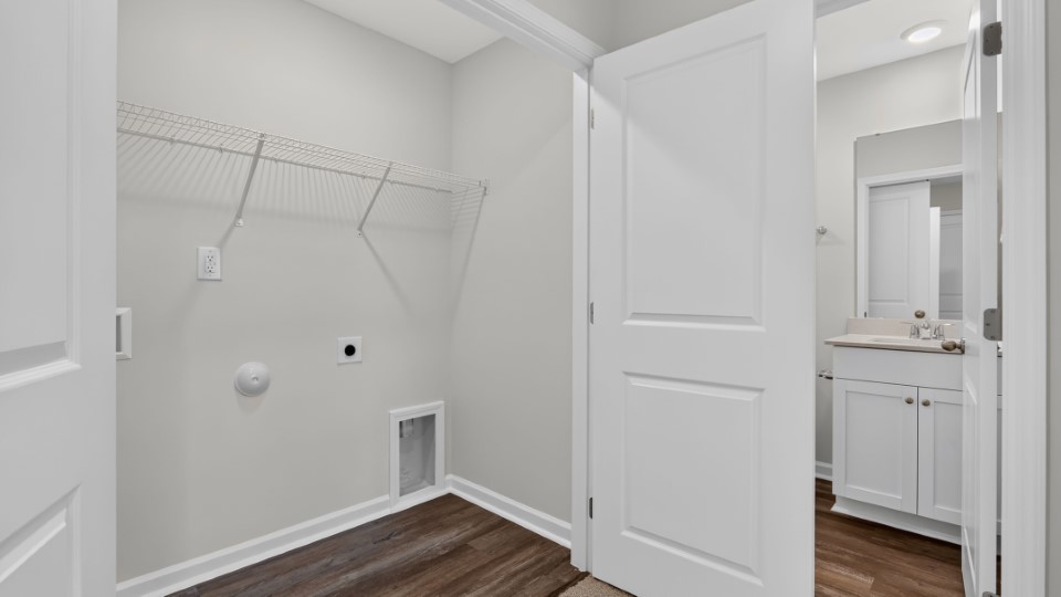 laundry room with wire shelving