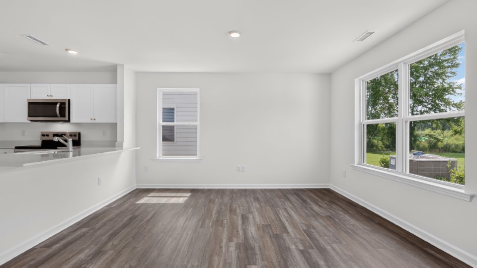 open concept living space with large windows