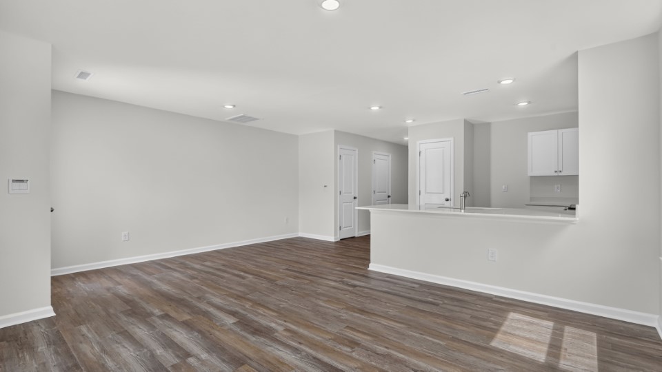 open concept living space with large windows