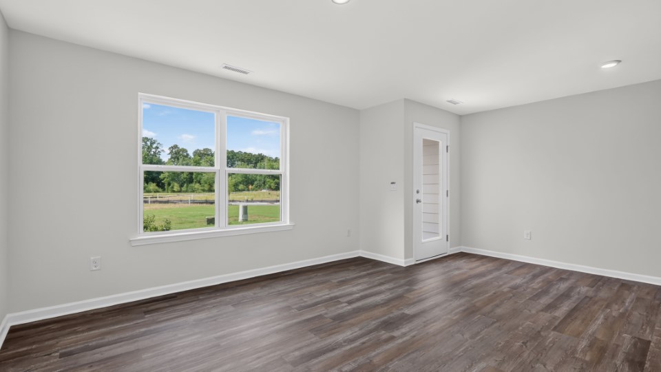 open concept living space with large windows