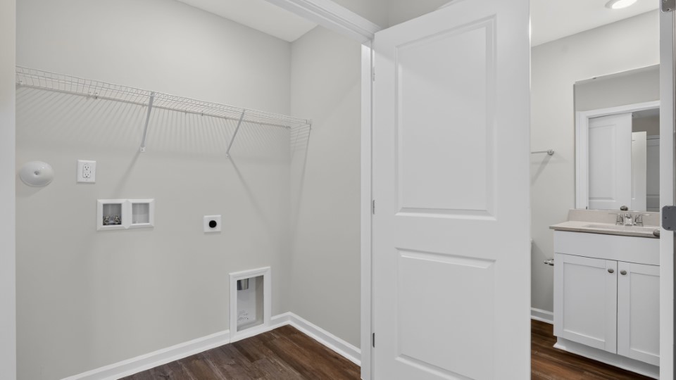 laundry room with wire shelving