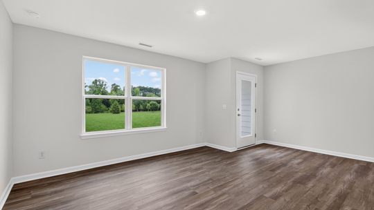 open concept living space with large windows
