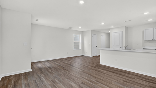 open concept living space with large windows