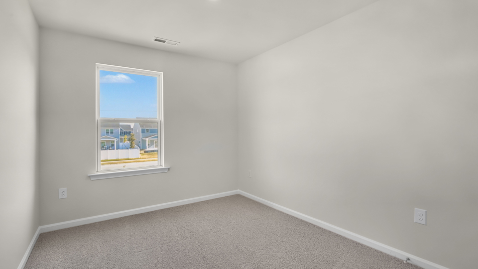 Bedroom with carpet flooring