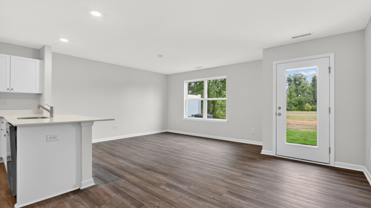 open concept living space with large windows