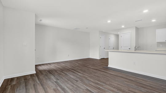 open concept living space with large windows