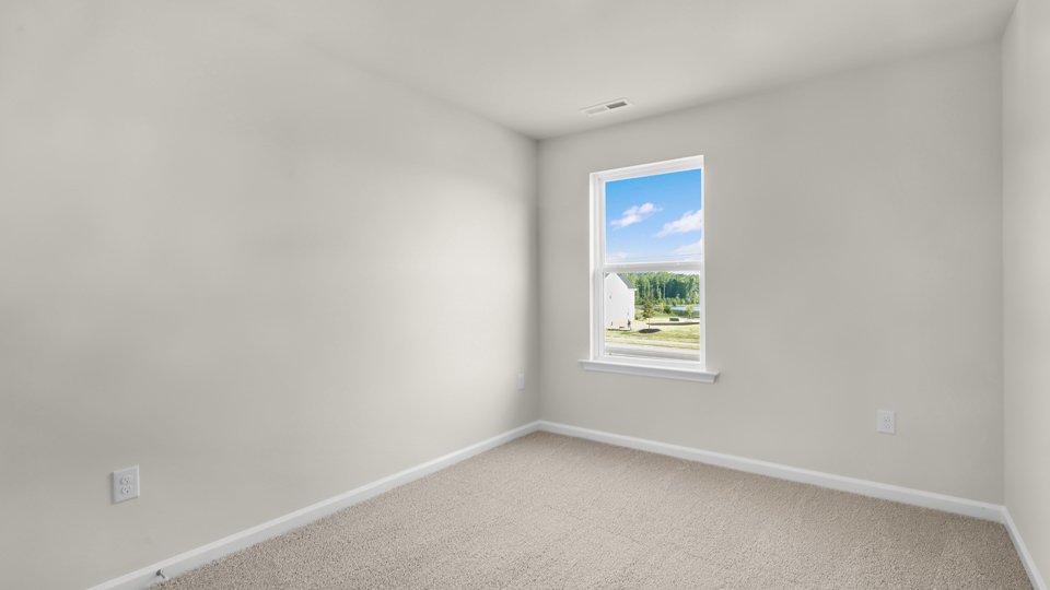 Bedroom with carpet flooring