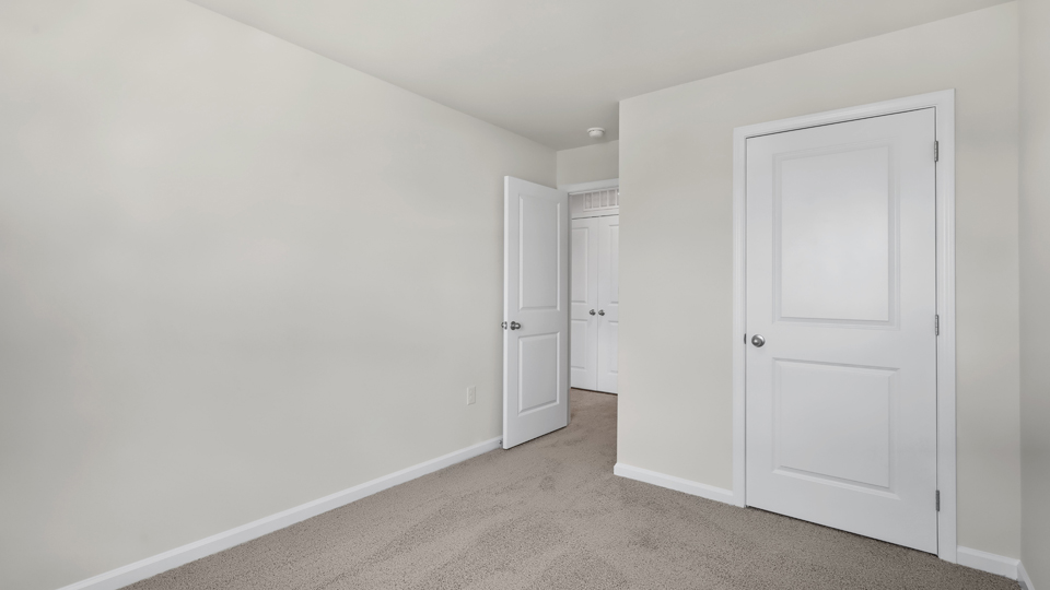 Bedroom with carpet flooring