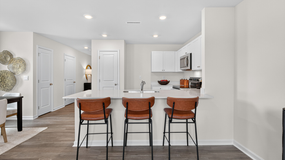 open concept dining space with door to patio