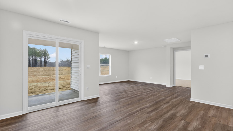 open concept living space with large windows