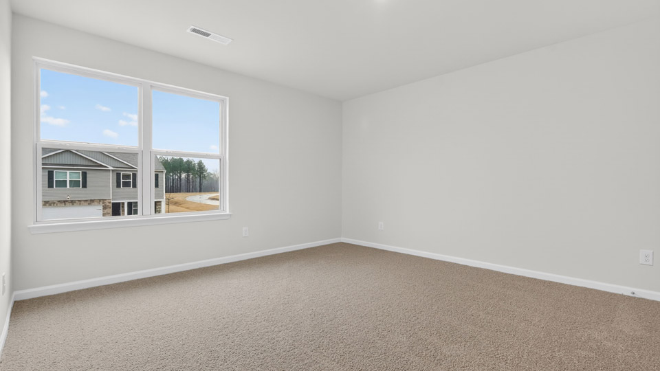 Bedroom with carpet floor and closet