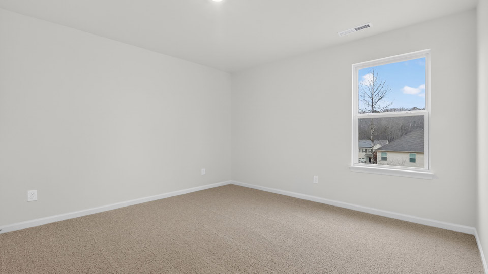 Bedroom with carpet floor and closet