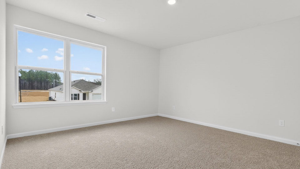Bedroom with carpet floor and closet