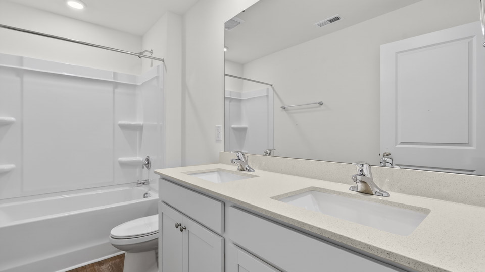 Bathroom with sink and tub