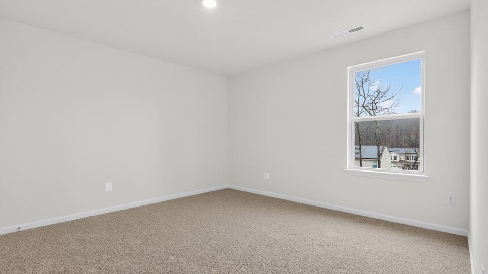 Bedroom with carpet floor and closet