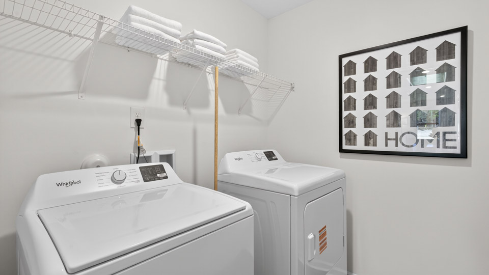 Laundry room with wired shelving