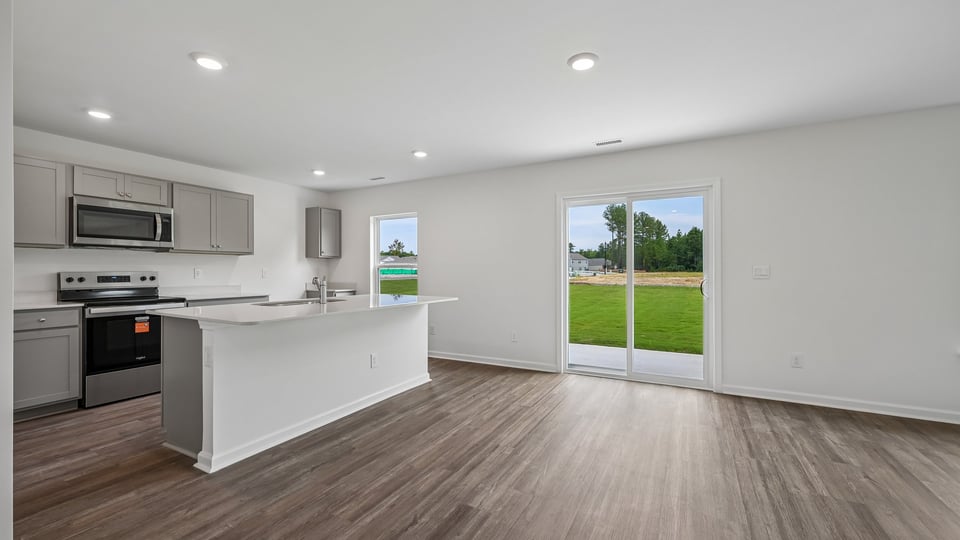 BREAKFAST AREA AND REAR PATIO DOORS