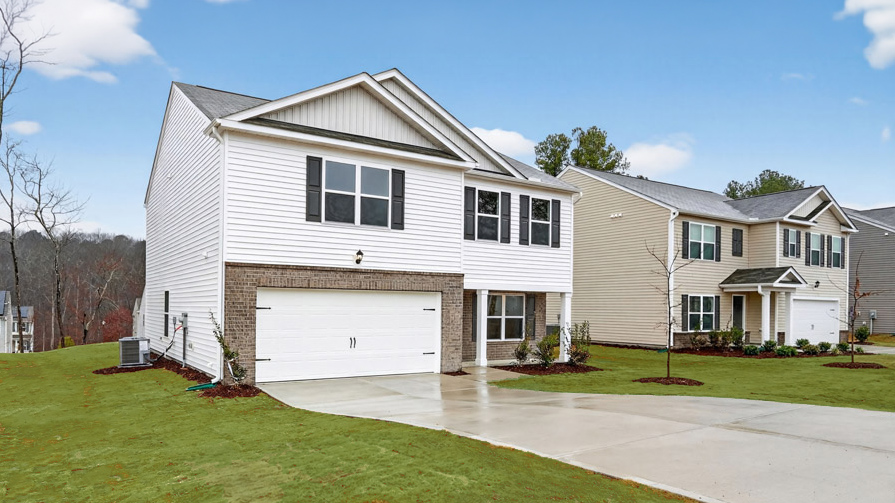 front exterior penwell K with 2 car garage