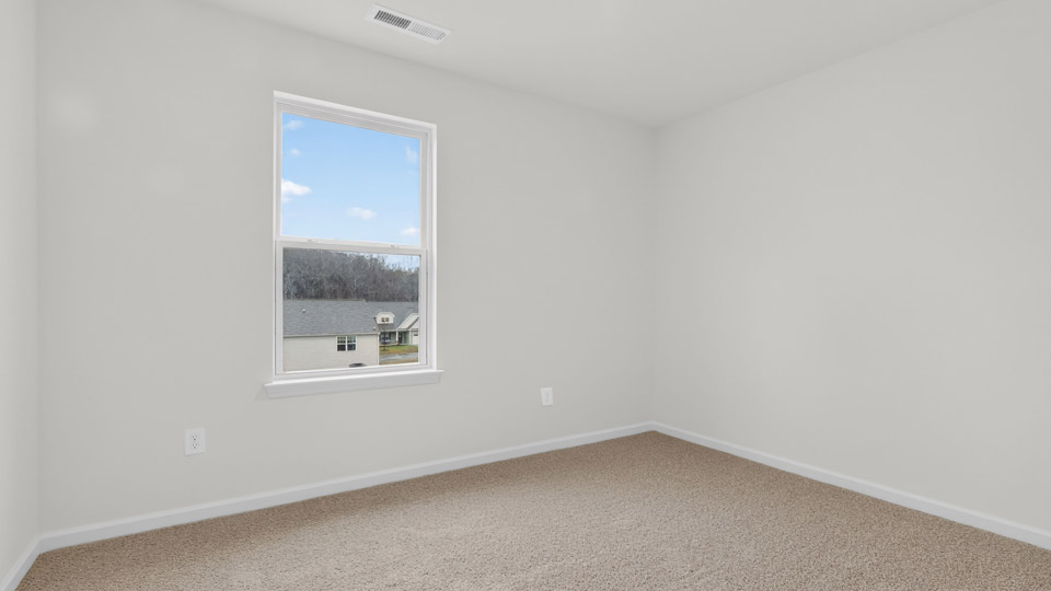 additional bedroom with window, carpeting, closet